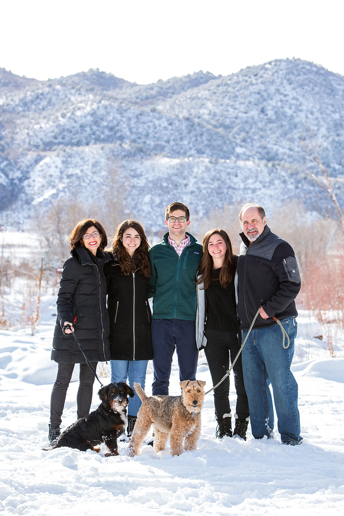 Dan and Elizabeth with their family and dogs celebrating their recent engagement.