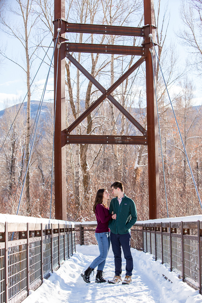 Elizabeth and Dan on a Basalt bridge after their Colorado surprise proposal.