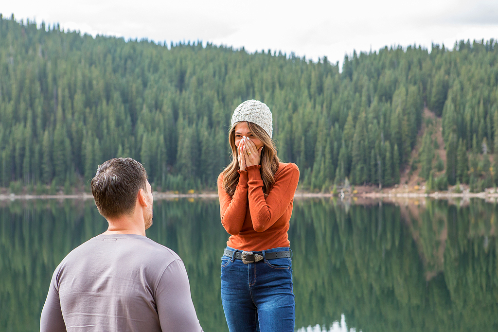 Mana covers her mouth as Dijon proposes Clinton Gulch Dam Reservoir in Colorado.