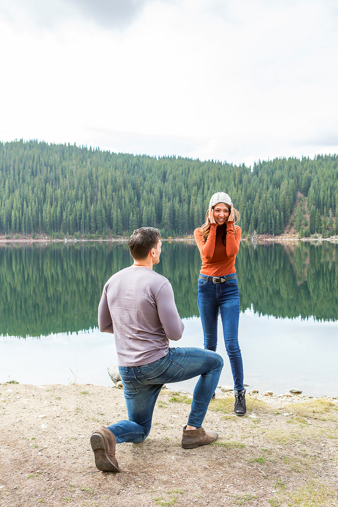Mana puts her hands on her face in surprise while Dijon proposes in Colorado.