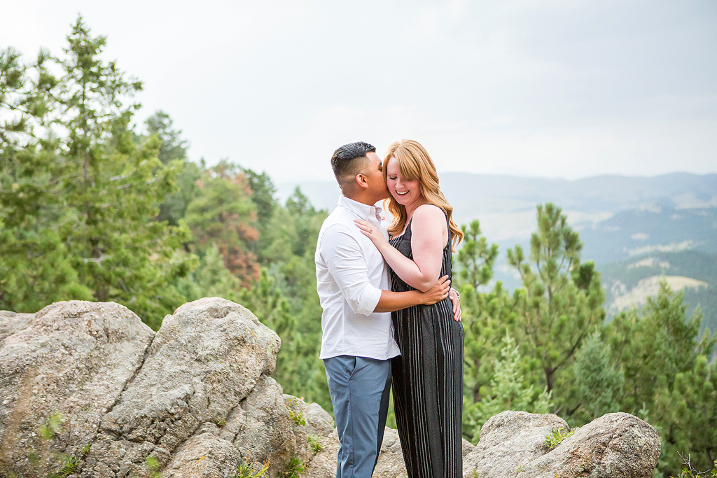 Luis and Nicole on Flagstaff Mountain in Boulder, Colorado during their surprise engagement.