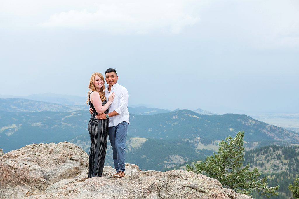 Luis and Nicole on top of the cliffs at Lost Gulch Overlook during their summer Colorado engagement.