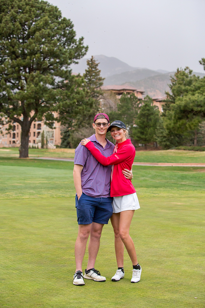 Matt and Morgan hug at the Broadmoor Golf Club moments after getting engaged in Colorado.
