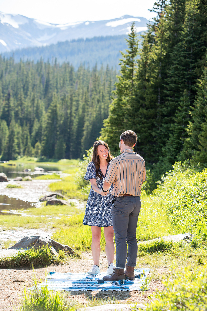 Madeline's look of surprise right after Matt popped the question along the Brainard Lake beach.