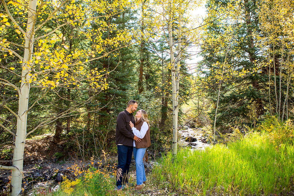 Nick and Alex near the creek at Ashcroft Ghost Town during their Colorado engagement.