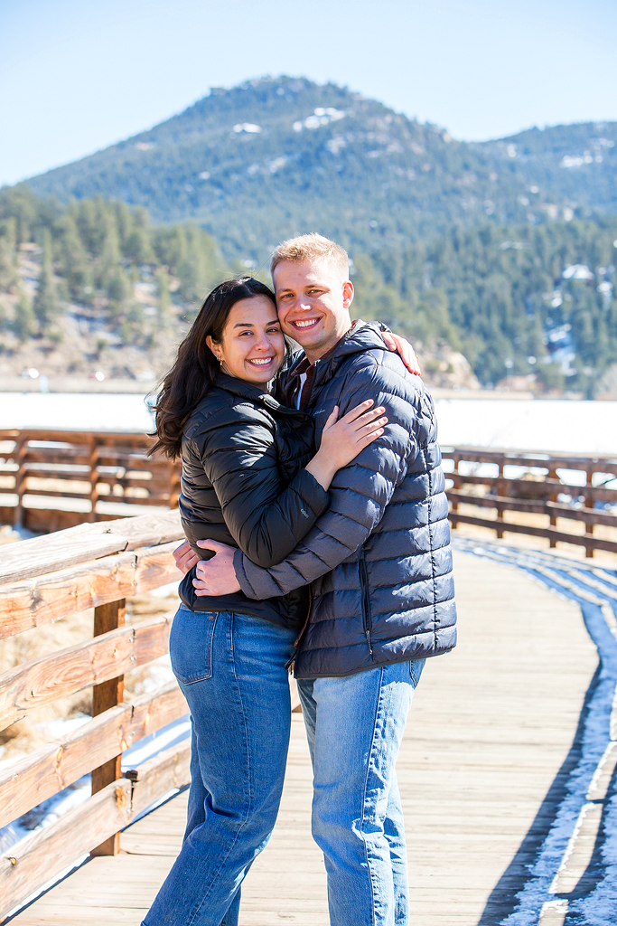 Ryan and Alissa on the boardwalk at Evergreen Lake during the spring after getting engaged.