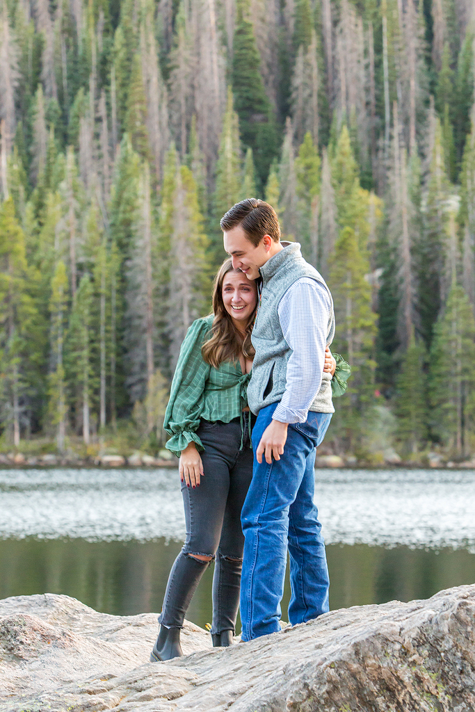 Will and Erika hug after the surprise proposal in RMNP, Colorado.