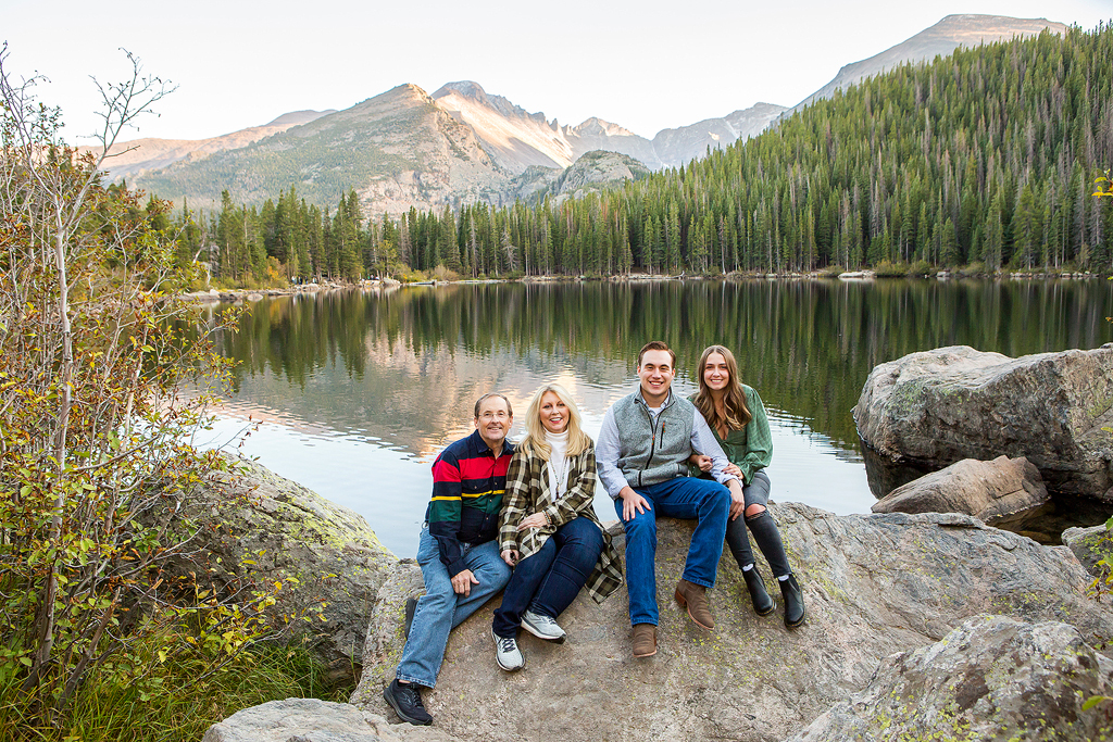 Will and Erika sit with family at Bear Lake after Will proposes during the fall.