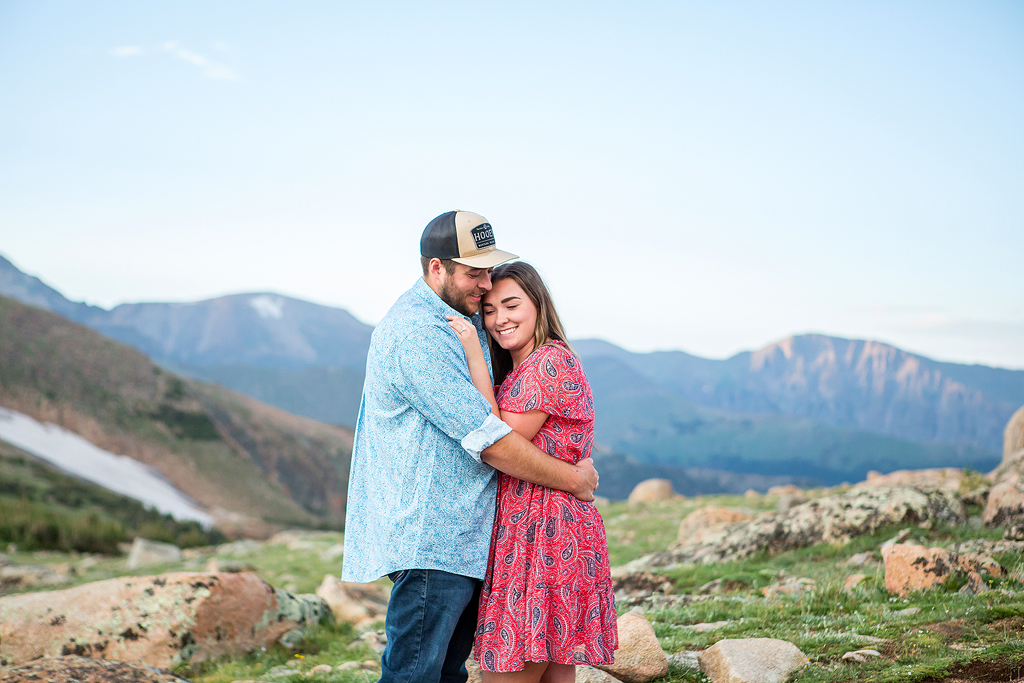 Zach gives Sabrina a hug during sunset in the high tundra in Rocky Mountain National Park.